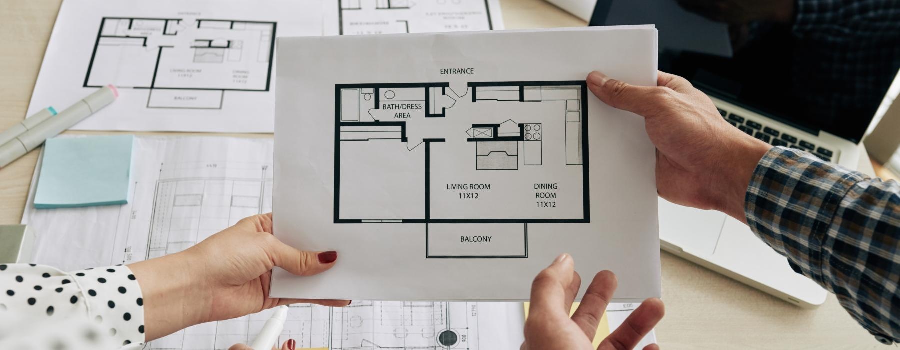 a group of people holding up a piece of paper